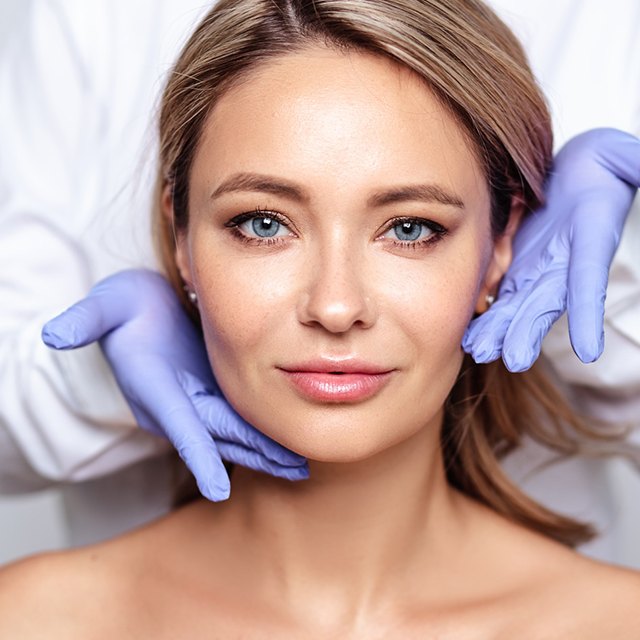 Medical practitioner showing results of patient’s BOTOX® injections