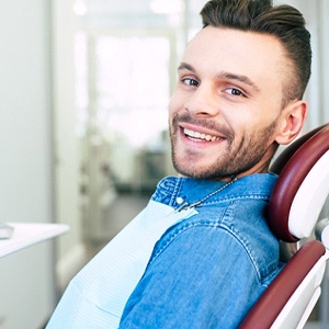 Happy patient, glad he could afford dental implants