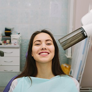 Smiling, happy oral surgery patient
