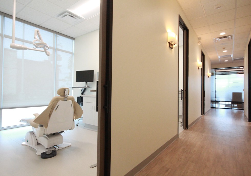 Hallway looking into dental office treatment room