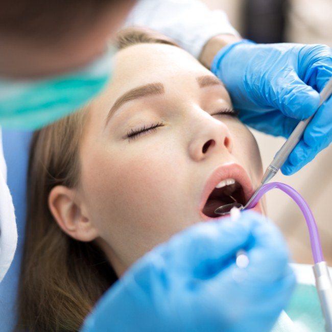 Patient receiving oral surgery under general anesthesia