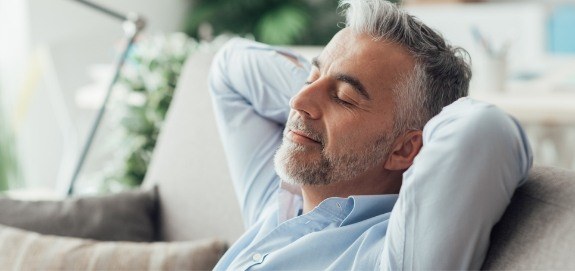 Man relaxing after sedation dentistry visit