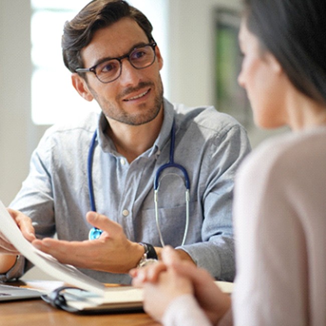 Patient speaking to doctor, learning about OSA treatment options