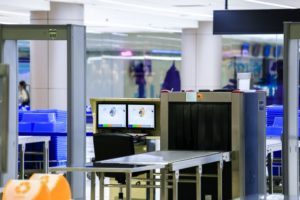 Metal detector and luggage scanner at airport