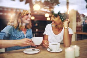 Two friends enjoying coffee together