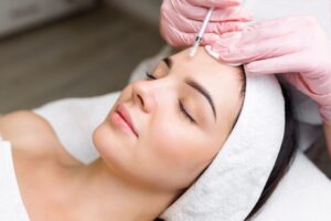 Woman relaxing while receiving BOTOX injection