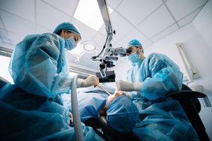 Oral surgery team working on patient